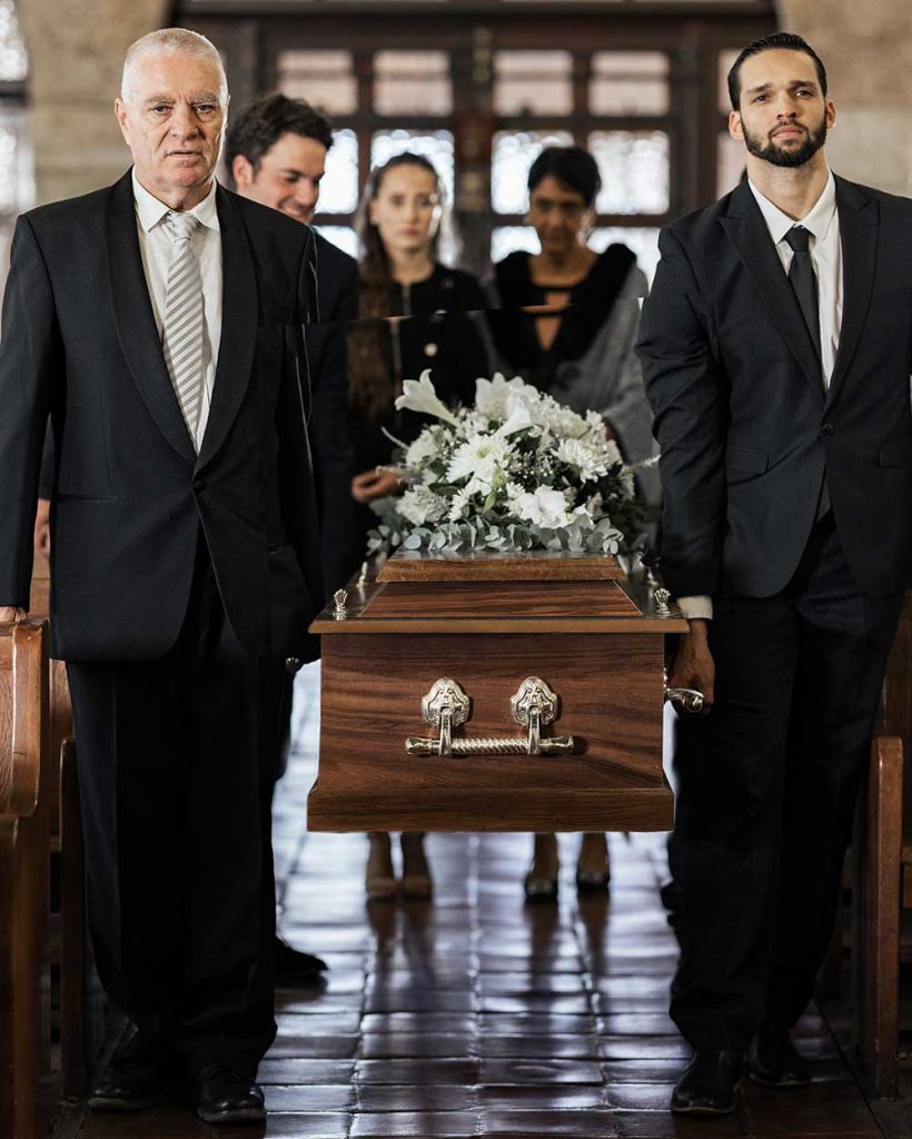 Funeral, church and family carry coffin for death, grief or sermon for burial with support. People,.